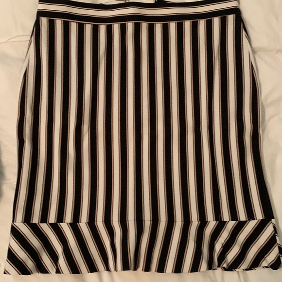 Dresses & Skirts - Check out my closet for a blue blouse and/or pants that coordinates.